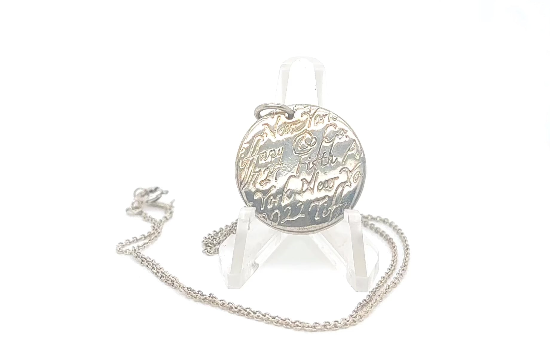 Tiffany & Co. Sterling Silver Round New York Fifth Ave Notes Pendant Necklace