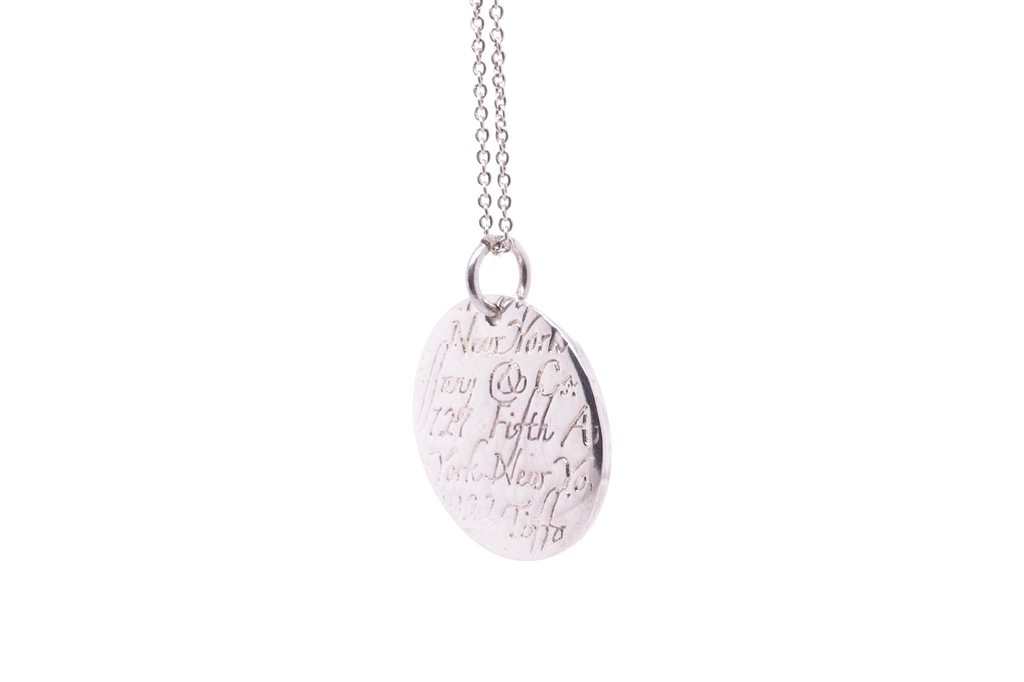 Tiffany & Co. Sterling Silver Round New York Fifth Ave Notes Pendant Necklace