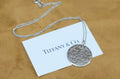 Tiffany & Co. Sterling Silver Round New York Fifth Ave Notes Pendant Necklace