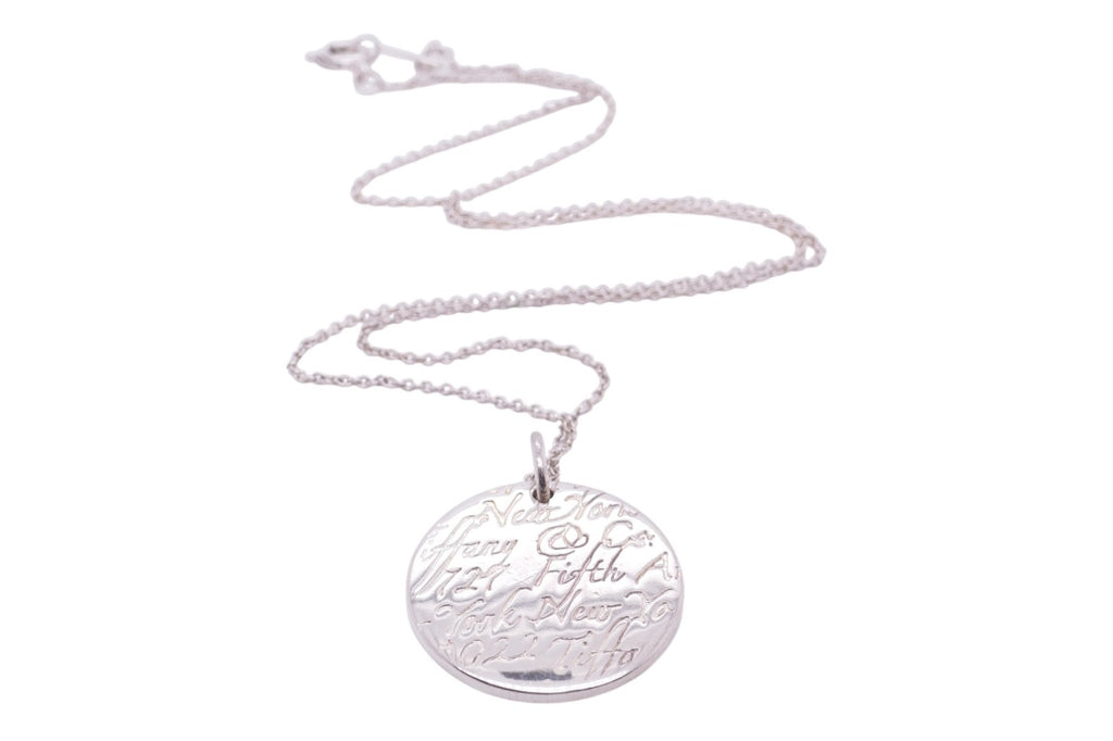 Tiffany & Co. Sterling Silver Round New York Fifth Ave Notes Pendant Necklace