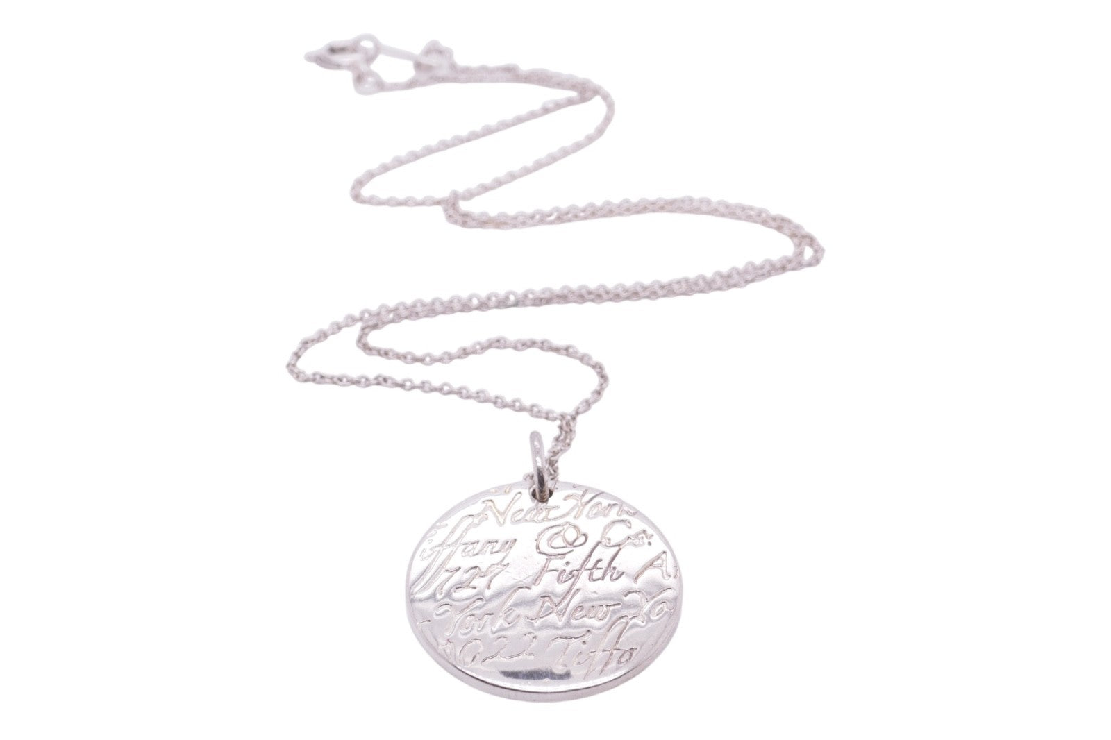 Tiffany & Co. Sterling Silver Round New York Fifth Ave Notes Pendant Necklace