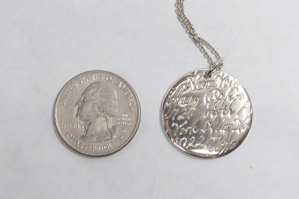 Tiffany & Co. Sterling Silver Round New York Fifth Ave Notes Pendant Necklace