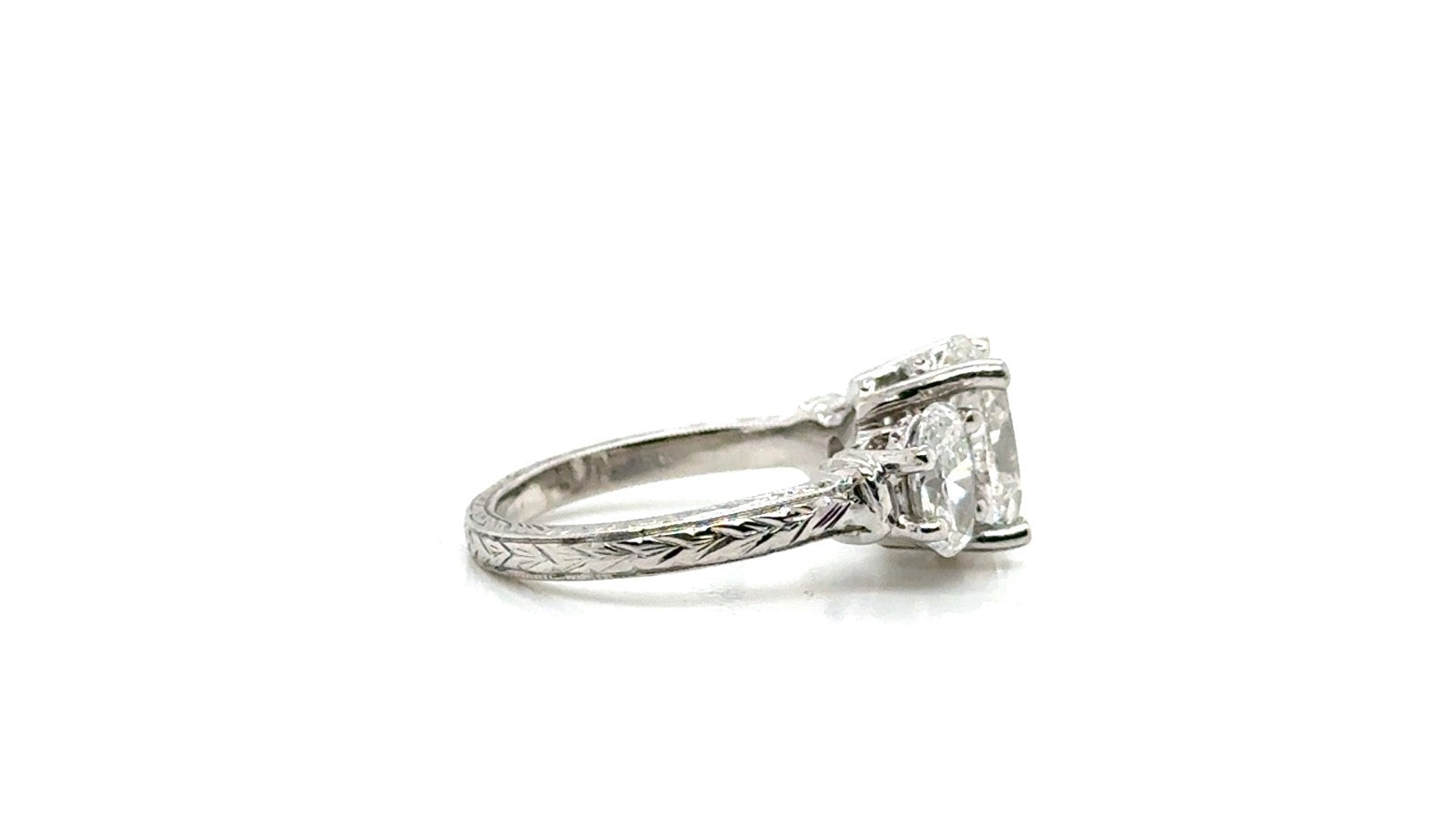 Platinum Diamond Three-Stone Ring – Engraved Band
