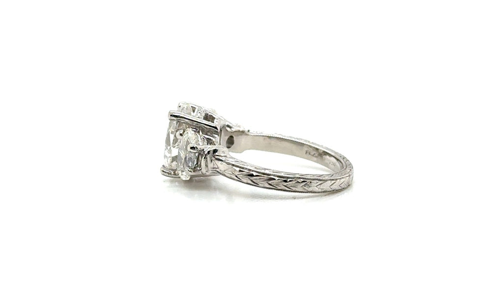 Platinum Diamond Three-Stone Ring – Engraved Band
